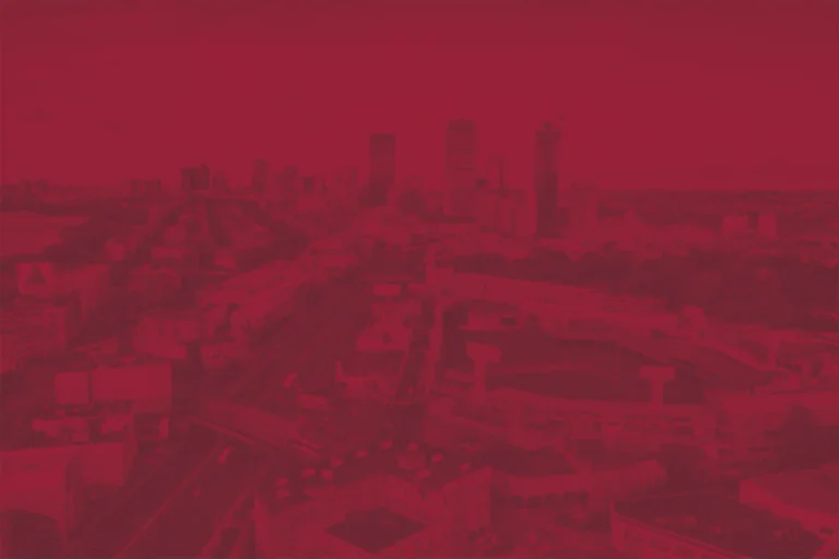 BC High cityscape red tinted background image